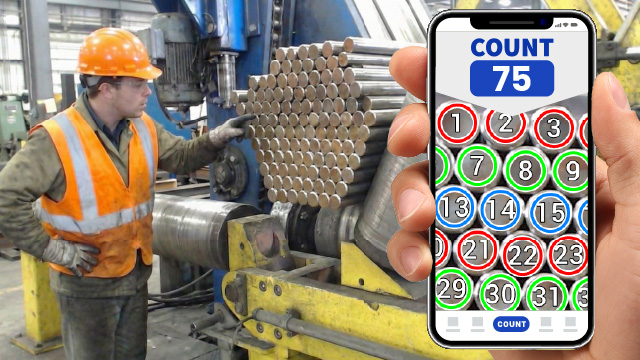 Automated quantity verification using the CountThings app of a bundled metal rods being prepared for loading on a warehouse.