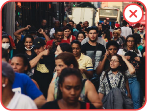 Large Crowd of People: This is not a good match for the 'CountThings from Photos' app because the inconsistent size between close and far items makes it difficult for the software to accurately isolate each person.